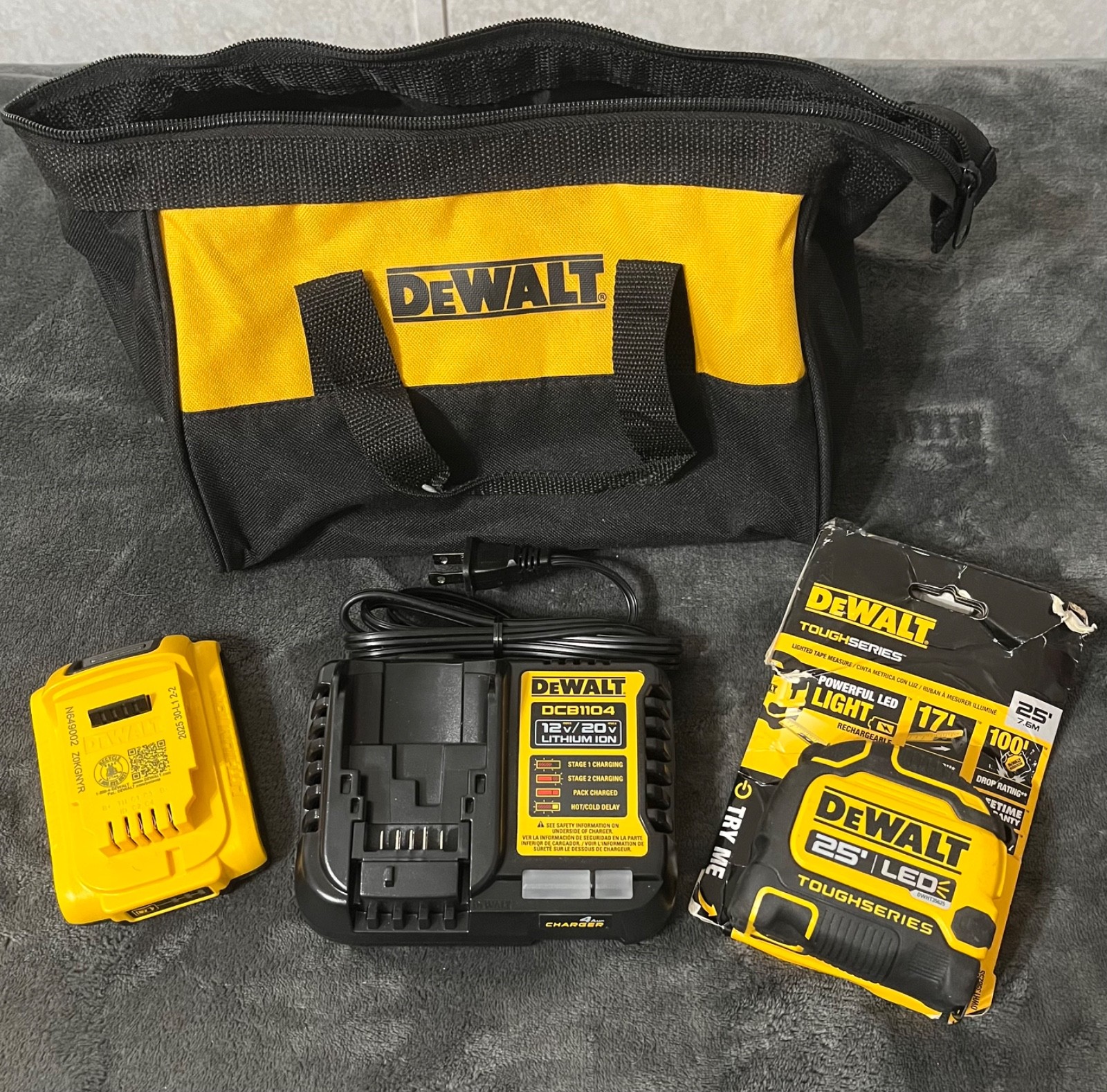DEWALT NEW DCB203 BATTERY, DCB1104 CHARGER, 25′ DEWALT LED TAPE, FREE DEWALT BAG