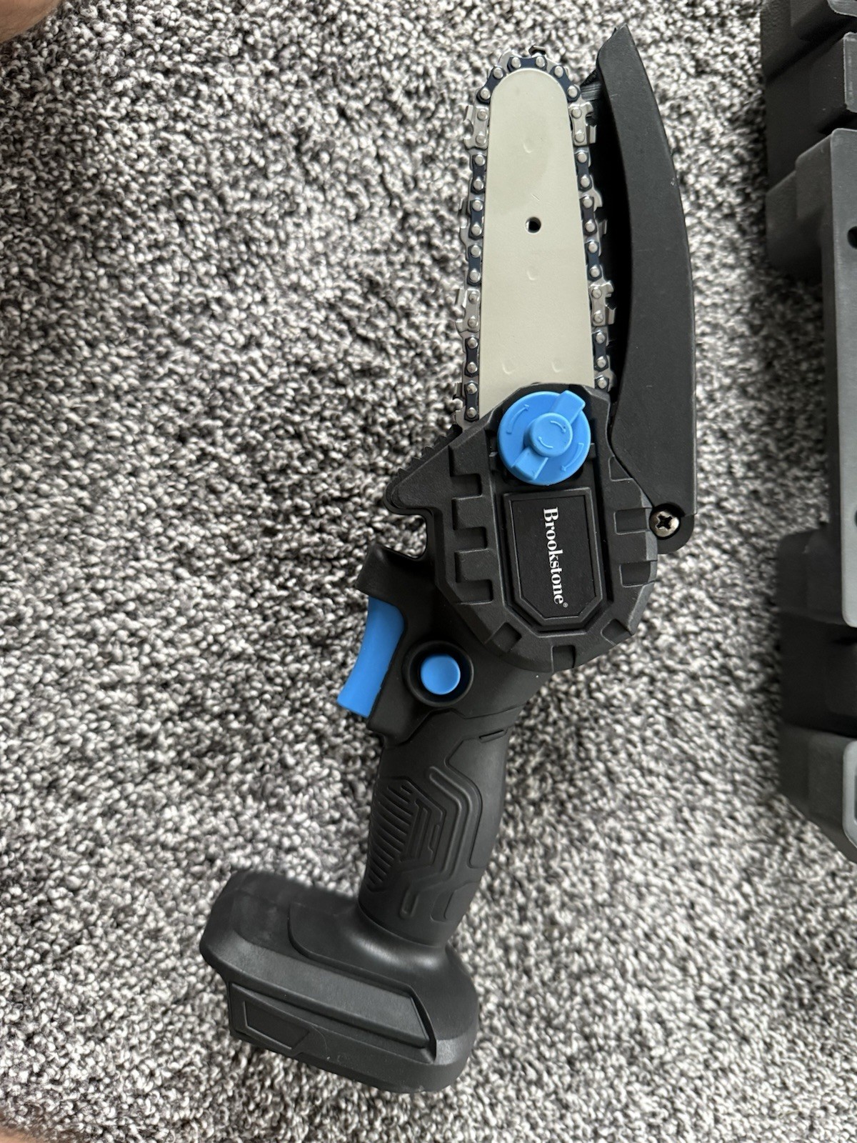 Brookstone Mini Electric Cordless Chainsaw Kit New