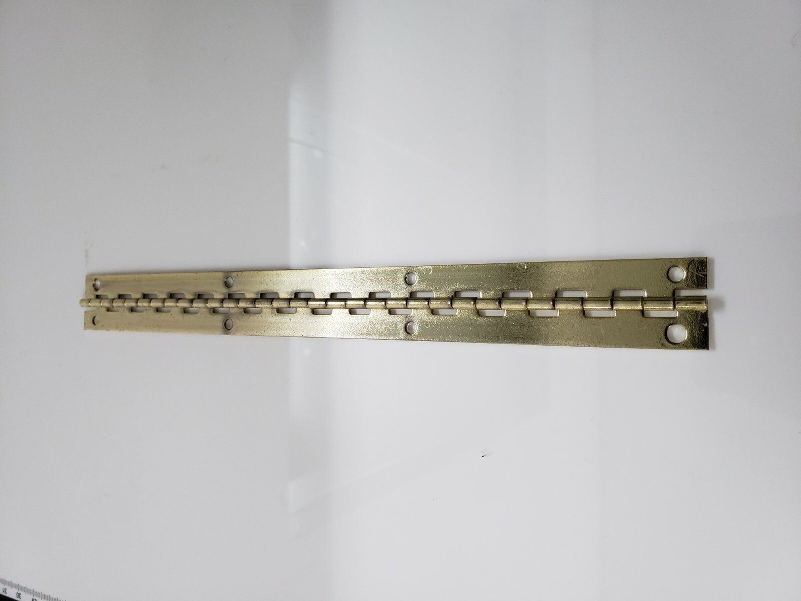2 piece Brass Plated Hinge 8″ long X .75″ wide with holes