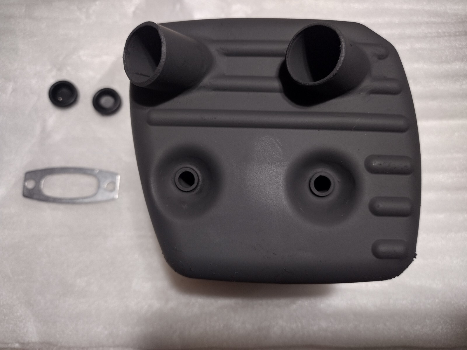 Dual port ( piped ) muffler for Husqvarna 3120XP. READ DESCRIPTION.