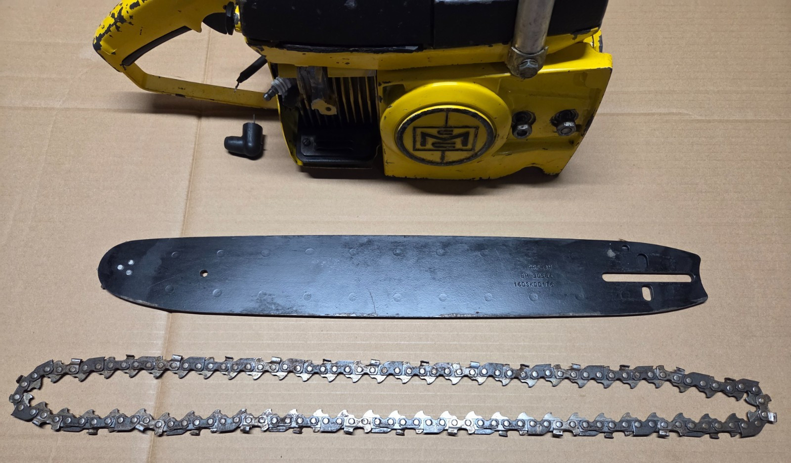 VINTAGE MCCULLOCH 10-10 CHAINSAW + 16″ BAR & BRAND NEW CHAIN AS IS FOR PARTS