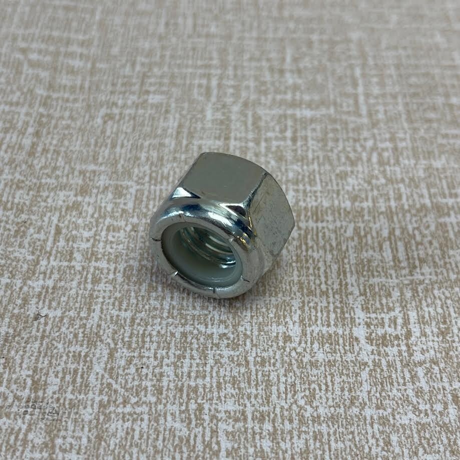 Dixie Chopper N-115 NUT,NYLOC 5/8-11 GR.A-CLR ZINC
