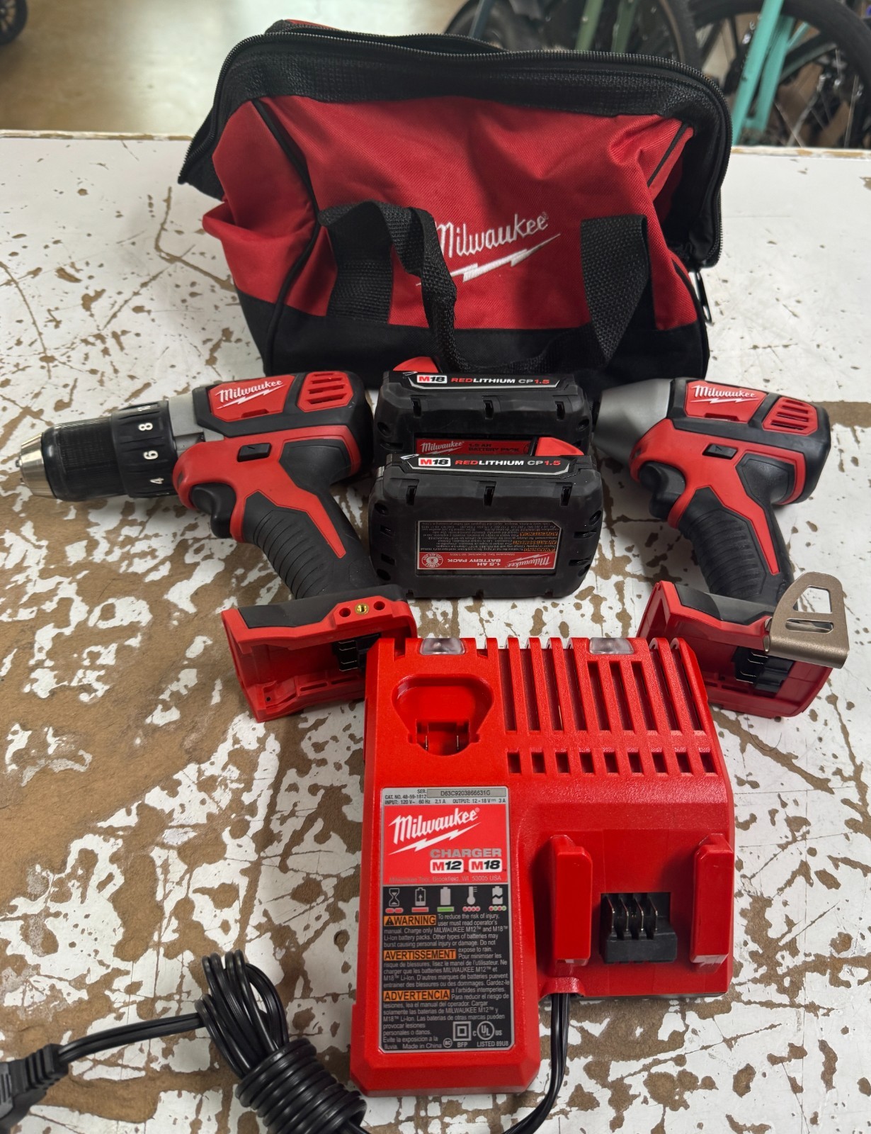 MILWAUKEE DRILL/IMPACT W/2X BATTERY + CHARGER + CASE – 2606-20/2656-20