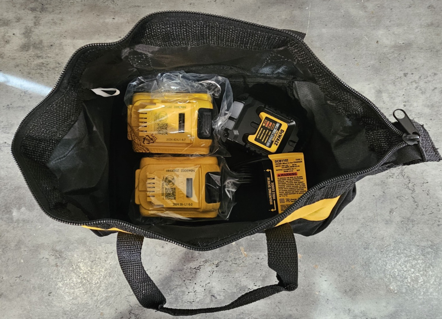 DeWALT Starter Kit DCB1102 Charger, 2 DCB203 2 AH 20V Batteries, & 11″ Tool Bag