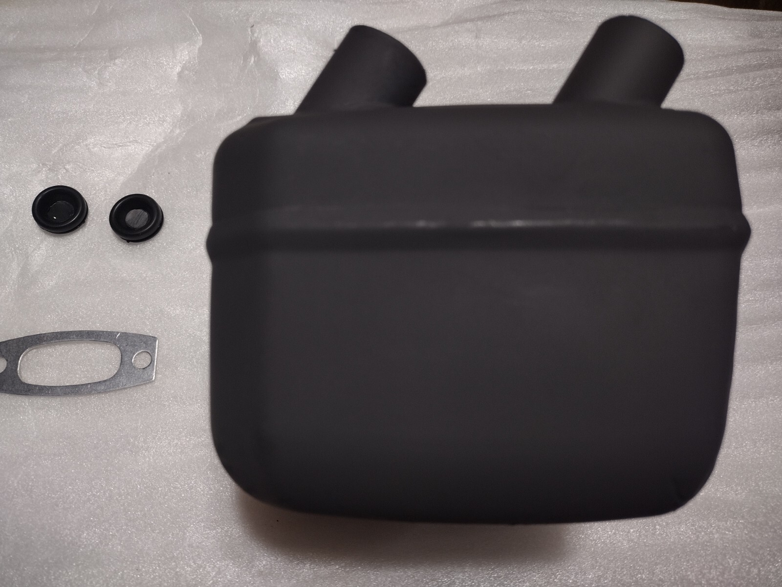 Dual port ( piped ) muffler for Husqvarna 3120XP. READ DESCRIPTION.