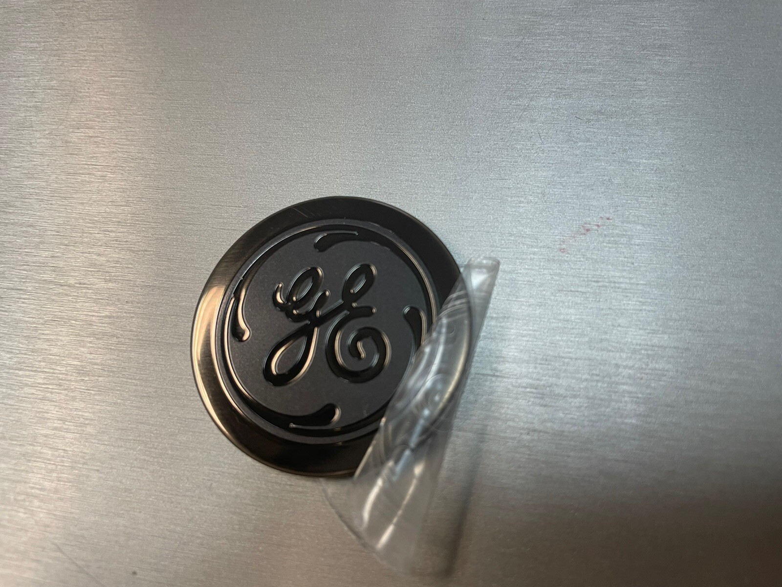 GE Dark SS Flat Badge WR02X38878, 1.50″DIAx 0.08″, compatible w WR02X31104, New