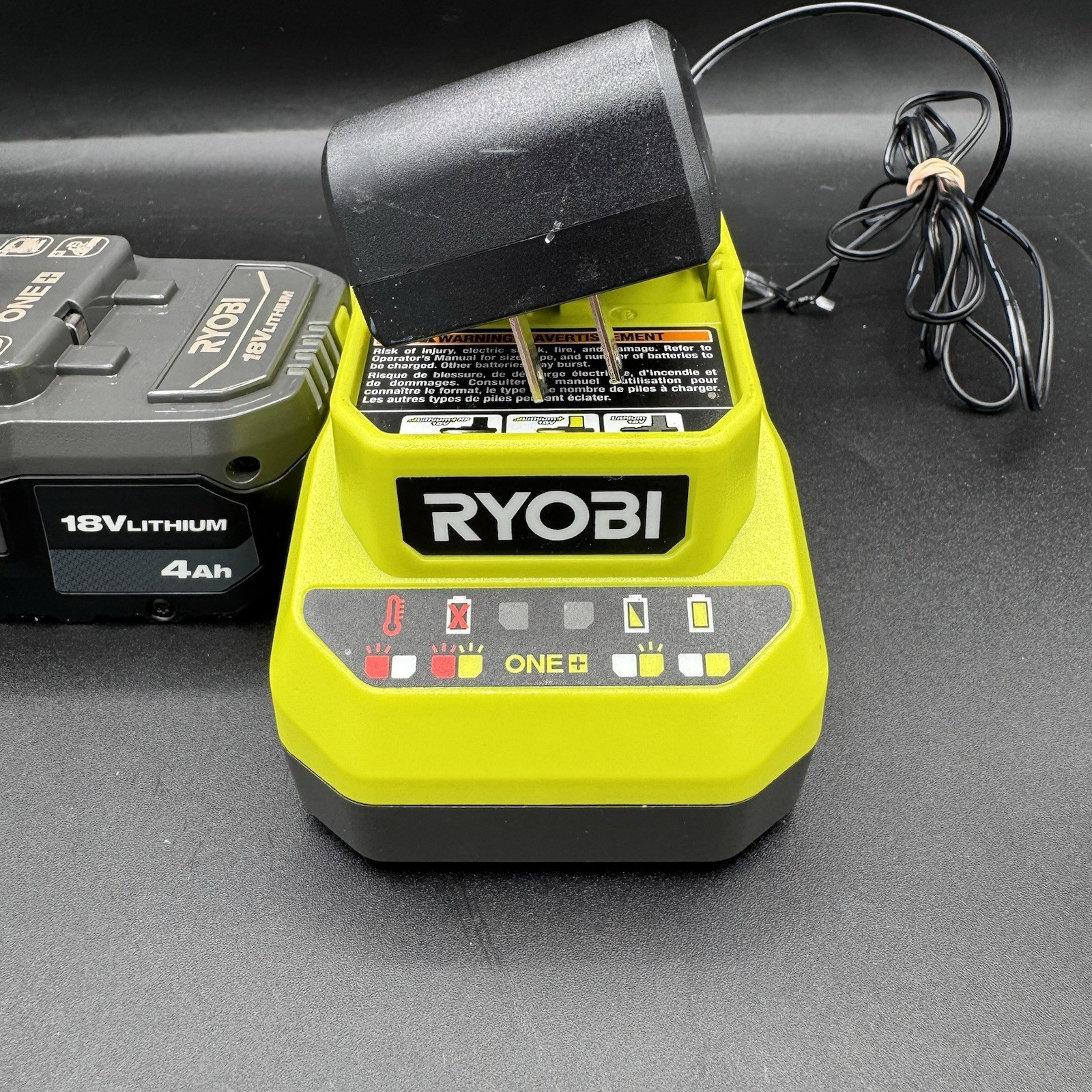 RYOBI ONE+ 18V 4.0 Ah Lithium-Ion Battery PBP005 and 18V Charger PCG002