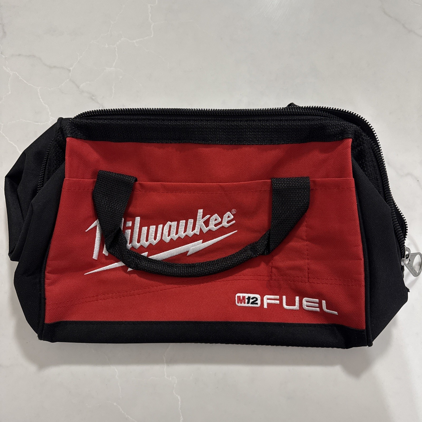 Milwaukee 2656-20 M18 Impact Driver 18V 1/4″ Hex and tool bag no battery