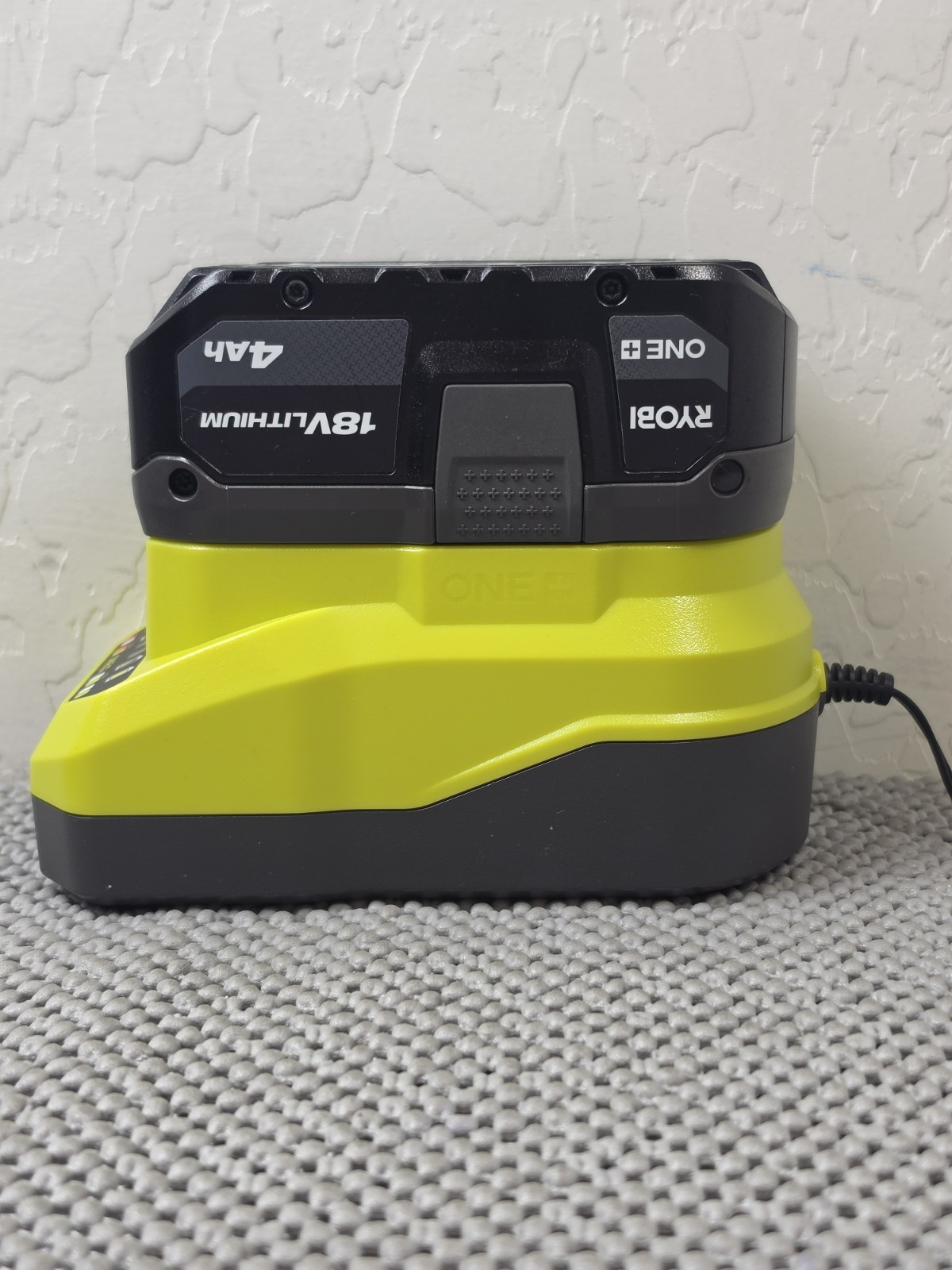 Ryobi PCG002 18V ONE+ Lithium-Ion Charger with Genuine Ryobi PBP005 4Ah Battery