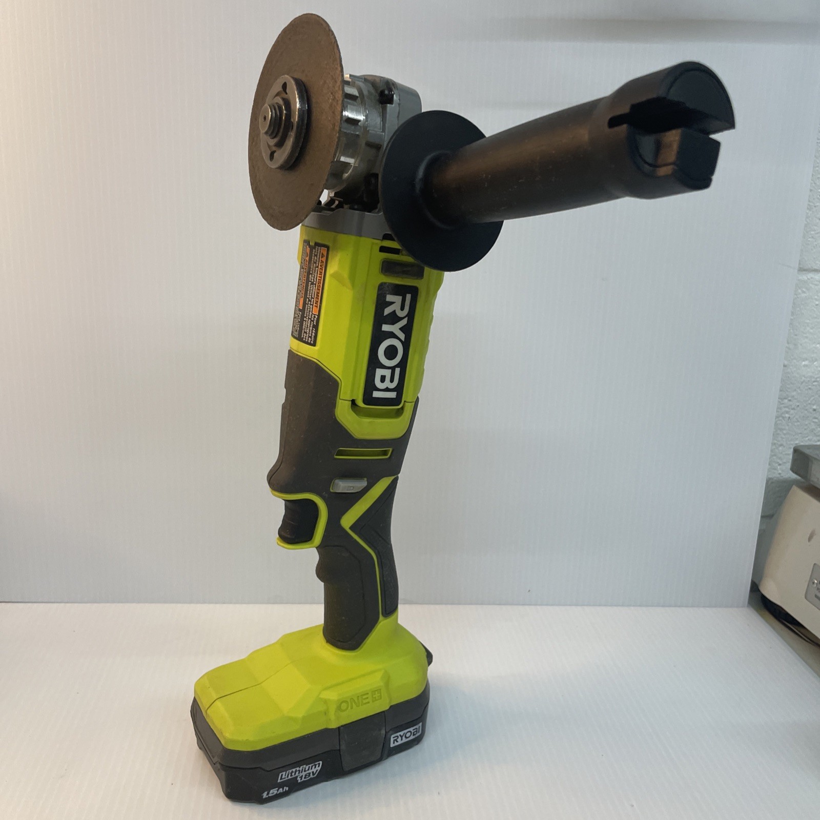 RYOBI ONE+ 18V Cordless 4-1/2 in. Angle Grinder W/ 1.5 AH Battery – Pre Owned