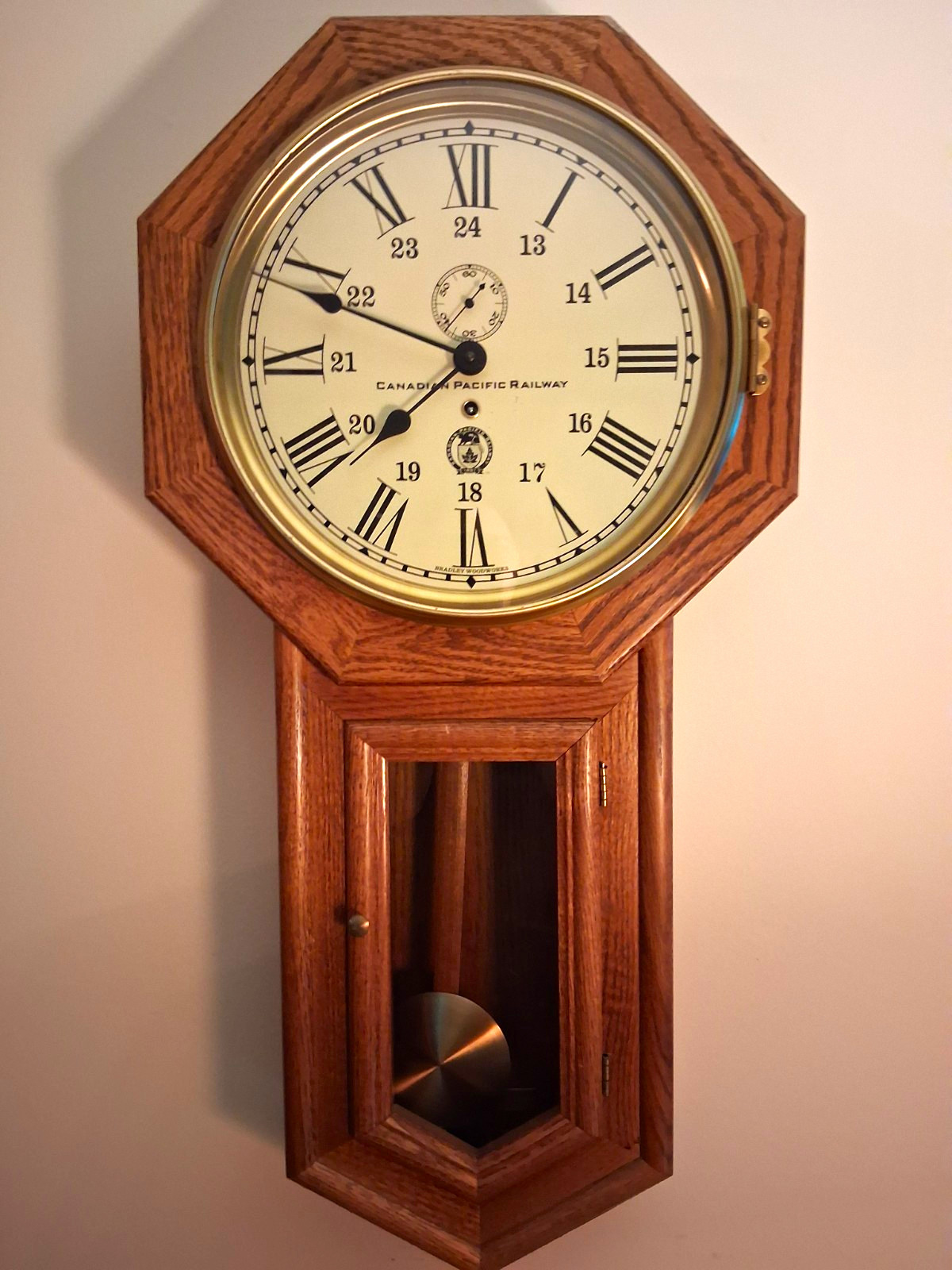 Bradley Woodworks Octagon Wood Hanging Wall Clock w/ Pendulum, Roman Numerals