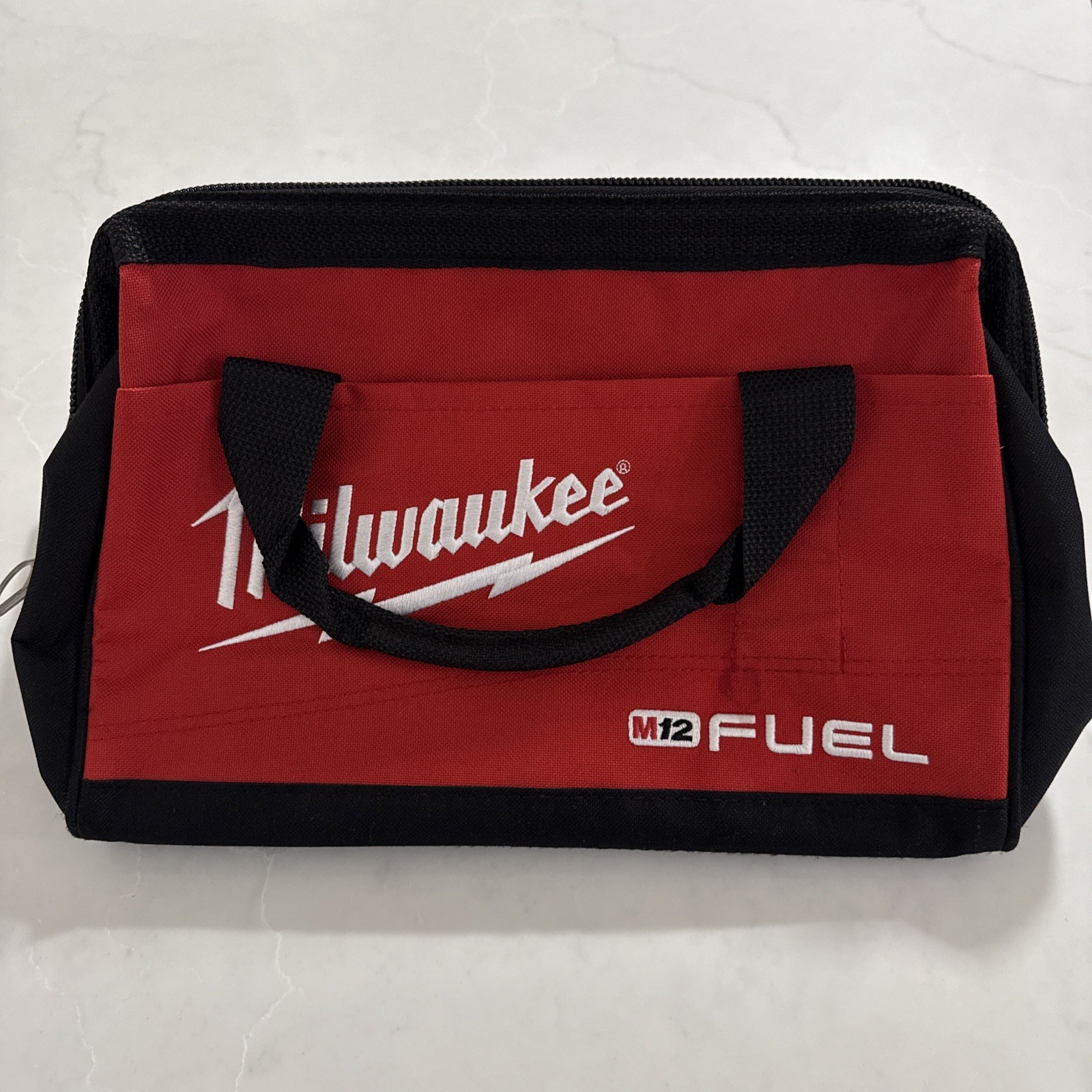 Milwaukee 2656-20 M18 Impact Driver 18V 1/4″ Hex and tool bag no battery