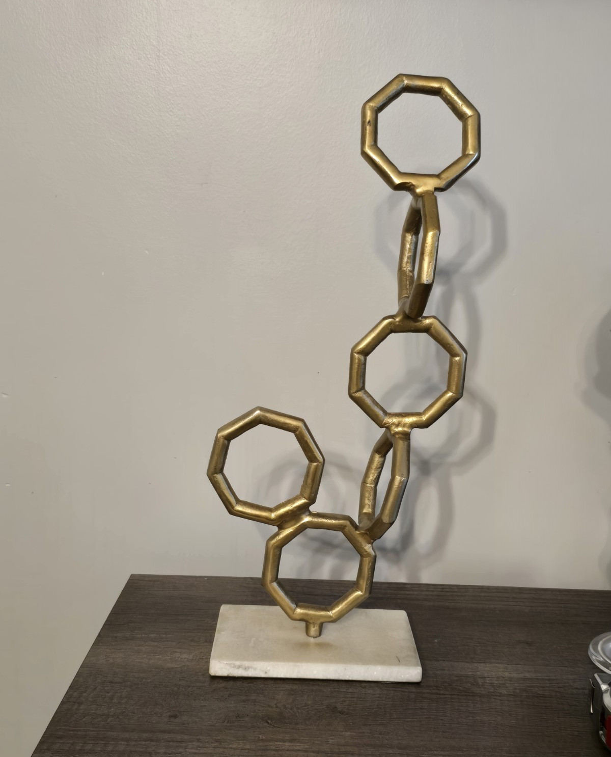 Abstract Gold Metal Octagon Link Sculpture on White Stone Base 18in Tall