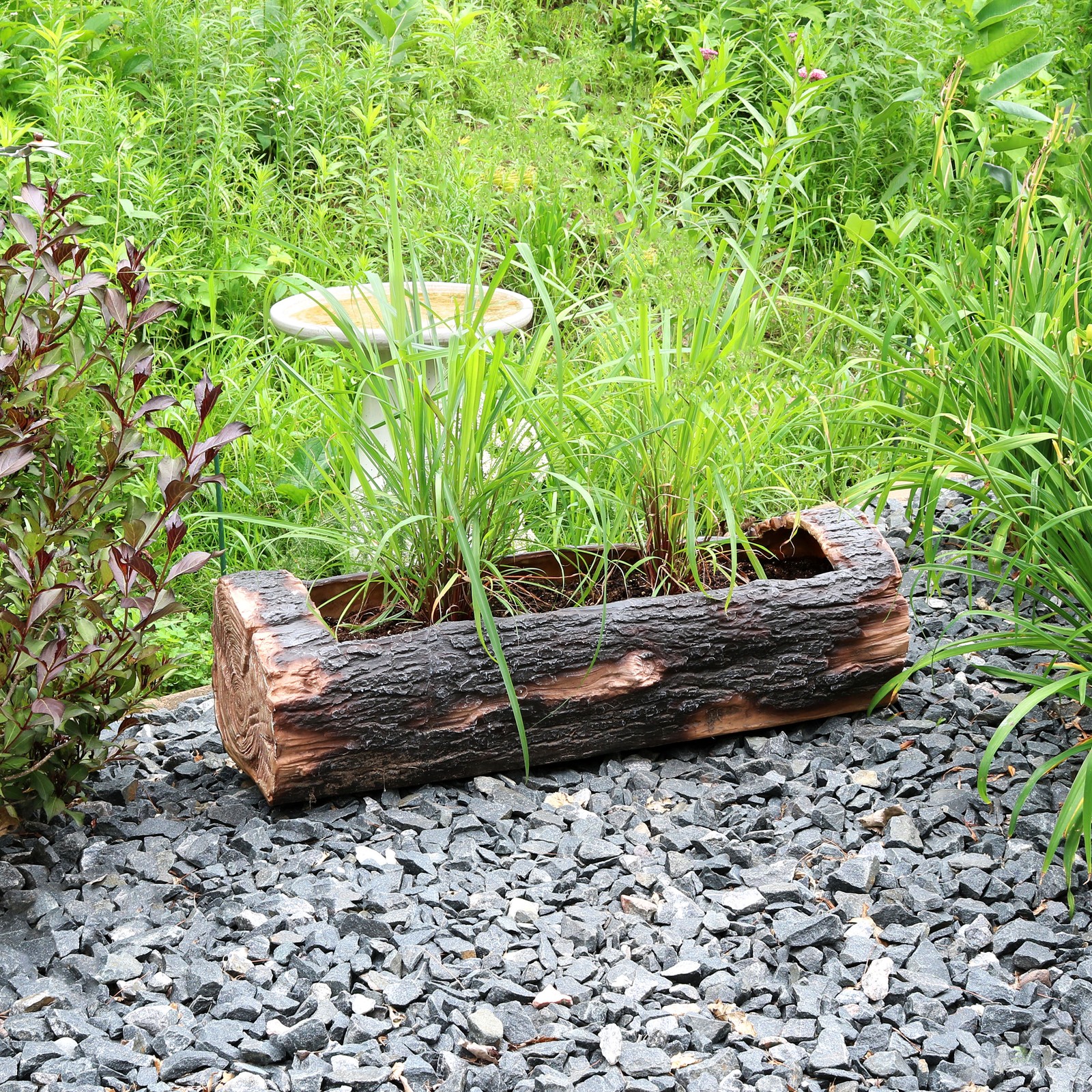 35 in Polyresin Rustic Outdoor Raised Log Flower Pot Planter by Sunnydaze