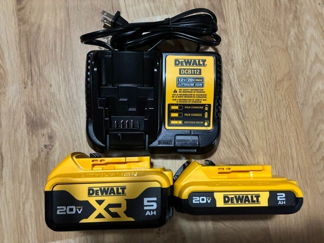 Two Dewalt Batteries DCB205 (5ah) and DCB203 (2ah) and DCB112 charger