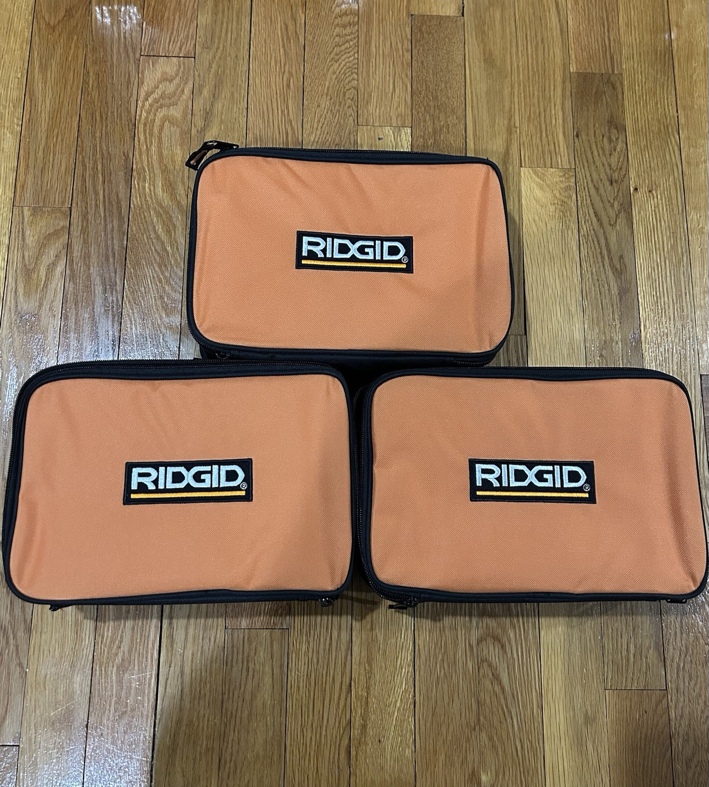 THREE (3) GENUINE RIDGID ORANGE TOOL BAGS 11 x 7 x 3.5″ ZIPPERED SOFT CASES NEW